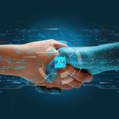 An android and human shaking hands with the word AI overlaid.